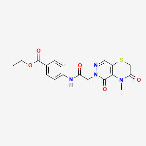 molecular formula C18H18N4O5S B2781447 ethyl 4-(2-{4-methyl-3,5-dioxo-2H,3H,4H,5H,6H-pyridazino[4,5-b][1,4]thiazin-6-yl}acetamido)benzoate CAS No. 1286709-38-3