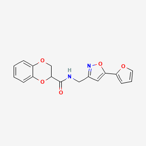 molecular formula C17H14N2O5 B2781597 N-((5-(furan-2-yl)isoxazol-3-yl)methyl)-2,3-dihydrobenzo[b][1,4]dioxine-2-carboxamide CAS No. 1210231-86-9
