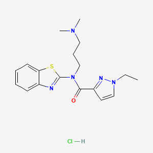 molecular formula C18H24ClN5OS B2781911 N-(1,3-benzothiazol-2-yl)-N-[3-(dimethylamino)propyl]-1-ethyl-1H-pyrazole-3-carboxamide hydrochloride CAS No. 1185015-13-7