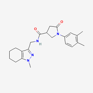 molecular formula C22H28N4O2 B2783552 1-(3,4-dimethylphenyl)-N-[(1-methyl-4,5,6,7-tetrahydro-1H-indazol-3-yl)methyl]-5-oxopyrrolidine-3-carboxamide CAS No. 1448062-71-2