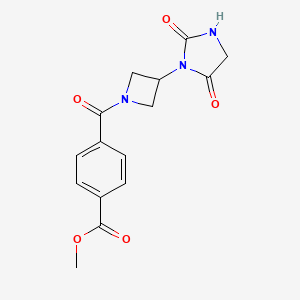 molecular formula C15H15N3O5 B2784638 Methyl 4-[3-(2,5-dioxoimidazolidin-1-yl)azetidine-1-carbonyl]benzoate CAS No. 2034278-06-1