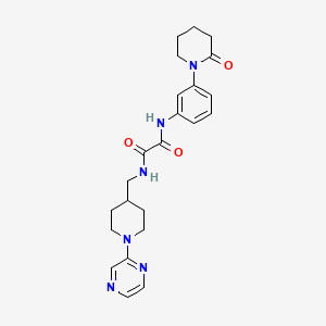 molecular formula C23H28N6O3 B2789059 N'-[3-(2-oxopiperidin-1-yl)phenyl]-N-{[1-(pyrazin-2-yl)piperidin-4-yl]methyl}ethanediamide CAS No. 1396759-88-8