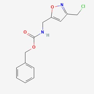 molecular formula C13H13ClN2O3 B2789232 Benzyl N-[[3-(chloromethyl)-1,2-oxazol-5-yl]methyl]carbamate CAS No. 2377034-34-7