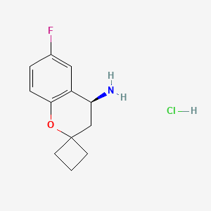 (4S)-6-fluoro-3,4-dihydrospiro[1-benzopyran-2,1'-cyclobutane]-4-amine hydrochloride
