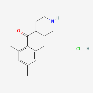 molecular formula C15H22ClNO B2793218 Mesityl(piperidin-4-yl)methanone hydrochloride CAS No. 42060-81-1