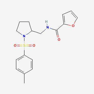 molecular formula C17H20N2O4S B2793922 N-((1-tosylpyrrolidin-2-yl)methyl)furan-2-carboxamide CAS No. 896276-72-5