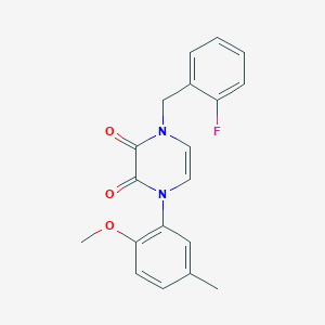 1-[(2-Fluorophenyl)methyl]-4-(2-methoxy-5-methylphenyl)pyrazine-2,3-dione