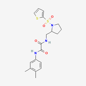 molecular formula C19H23N3O4S2 B2794135 N1-(3,4-dimethylphenyl)-N2-((1-(thiophen-2-ylsulfonyl)pyrrolidin-2-yl)methyl)oxalamide CAS No. 896283-22-0