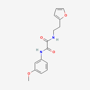 molecular formula C15H16N2O4 B2794361 N-[2-(furan-2-yl)ethyl]-N'-(3-methoxyphenyl)ethanediamide CAS No. 898374-09-9