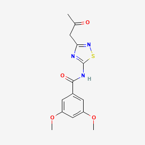 molecular formula C14H15N3O4S B2794619 3,5-dimethoxy-N-[3-(2-oxopropyl)-1,2,4-thiadiazol-5-yl]benzamide CAS No. 901002-59-3