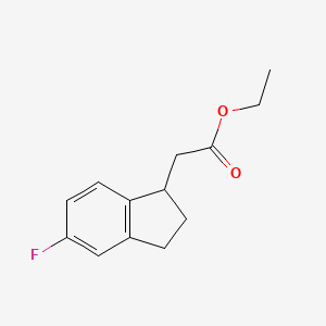 molecular formula C13H15FO2 B2794779 Ethyl 5-Fluoro-2,3-dihydroindene-1-acetate CAS No. 904290-44-4