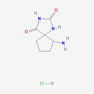molecular formula C7H12ClN3O2 B2795367 9-Amino-1,3-diazaspiro[4.4]nonane-2,4-dione;hydrochloride CAS No. 2408959-25-9