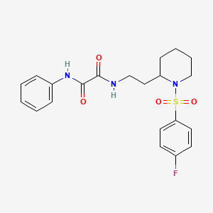 molecular formula C21H24FN3O4S B2796600 N-{2-[1-(4-fluorobenzenesulfonyl)piperidin-2-yl]ethyl}-N'-phenylethanediamide CAS No. 898445-19-7