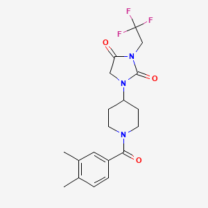 molecular formula C19H22F3N3O3 B2797302 1-[1-(3,4-Dimethylbenzoyl)piperidin-4-yl]-3-(2,2,2-trifluoroethyl)imidazolidine-2,4-dione CAS No. 2097918-29-9