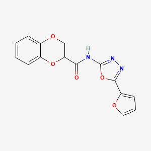 molecular formula C15H11N3O5 B2797341 N-(5-(furan-2-yl)-1,3,4-oxadiazol-2-yl)-2,3-dihydrobenzo[b][1,4]dioxine-2-carboxamide CAS No. 851095-53-9