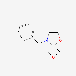 molecular formula C12H15NO2 B2797941 8-Benzyl-2,5-dioxa-8-azaspiro[3.4]octane CAS No. 1823915-10-1