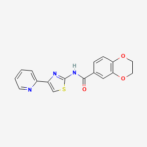 molecular formula C17H13N3O3S B2798041 N-[4-(pyridin-2-yl)-1,3-thiazol-2-yl]-2,3-dihydro-1,4-benzodioxine-6-carboxamide CAS No. 477551-65-8