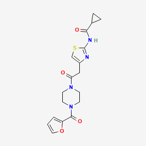 molecular formula C18H20N4O4S B2800056 N-(4-{2-[4-(furan-2-carbonyl)piperazin-1-yl]-2-oxoethyl}-1,3-thiazol-2-yl)cyclopropanecarboxamide CAS No. 923174-08-7