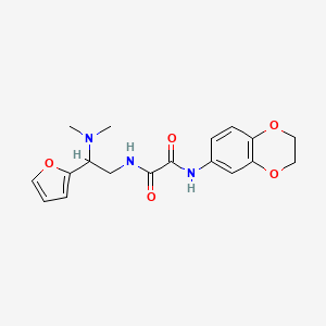molecular formula C18H21N3O5 B2800847 N'-(2,3-dihydro-1,4-benzodioxin-6-yl)-N-[2-(dimethylamino)-2-(furan-2-yl)ethyl]ethanediamide CAS No. 899998-93-7