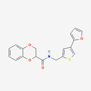 molecular formula C18H15NO4S B2801023 N-{[4-(furan-2-yl)thiophen-2-yl]methyl}-2,3-dihydro-1,4-benzodioxine-2-carboxamide CAS No. 2379997-69-8
