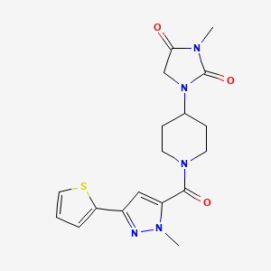 3-methyl-1-(1-(1-methyl-3-(thiophen-2-yl)-1H-pyrazole-5-carbonyl)piperidin-4-yl)imidazolidine-2,4-dione