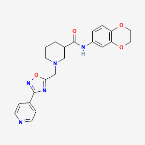 molecular formula C22H23N5O4 B2803425 N-(2,3-dihydro-1,4-benzodioxin-6-yl)-1-{[3-(pyridin-4-yl)-1,2,4-oxadiazol-5-yl]methyl}piperidine-3-carboxamide CAS No. 1286732-23-7