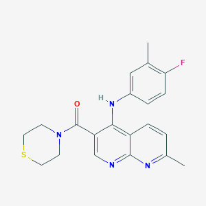 molecular formula C21H21FN4OS B2803597 N-(4-fluoro-3-methylphenyl)-7-methyl-3-(thiomorpholine-4-carbonyl)-1,8-naphthyridin-4-amine CAS No. 1251619-79-0