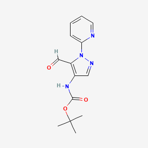 molecular formula C14H16N4O3 B2804521 tert-butyl N-[5-formyl-1-(pyridin-2-yl)-1H-pyrazol-4-yl]carbamate CAS No. 2219376-00-6