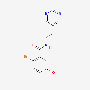 2-bromo-5-methoxy-N-(2-(pyrimidin-5-yl)ethyl)benzamide