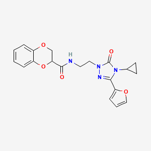 B2805486 N-(2-(4-cyclopropyl-3-(furan-2-yl)-5-oxo-4,5-dihydro-1H-1,2,4-triazol-1-yl)ethyl)-2,3-dihydrobenzo[b][1,4]dioxine-2-carboxamide CAS No. 1797060-81-1
