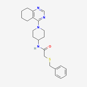 molecular formula C22H28N4OS B2805527 2-(benzylsulfanyl)-N-[1-(5,6,7,8-tetrahydroquinazolin-4-yl)piperidin-4-yl]acetamide CAS No. 1903592-05-1