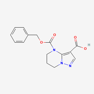molecular formula C15H15N3O4 B2805655 4-Phenylmethoxycarbonyl-6,7-dihydro-5H-pyrazolo[1,5-a]pyrimidine-3-carboxylic acid CAS No. 2248368-49-0