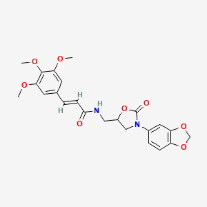 (E)-N-((3-(benzo[d][1,3]dioxol-5-yl)-2-oxooxazolidin-5-yl)methyl)-3-(3,4,5-trimethoxyphenyl)acrylamide