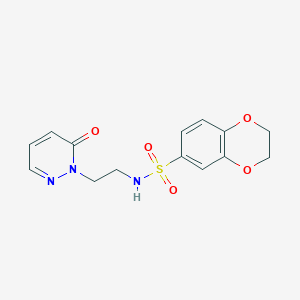 molecular formula C14H15N3O5S B2808886 N-(2-(6-oxopyridazin-1(6H)-yl)ethyl)-2,3-dihydrobenzo[b][1,4]dioxine-6-sulfonamide CAS No. 1021219-06-6