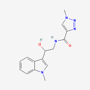 molecular formula C15H17N5O2 B2809158 N-(2-hydroxy-2-(1-methyl-1H-indol-3-yl)ethyl)-1-methyl-1H-1,2,3-triazole-4-carboxamide CAS No. 2034539-74-5