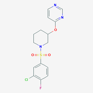 molecular formula C15H15ClFN3O3S B2809563 4-((1-((3-Chloro-4-fluorophenyl)sulfonyl)piperidin-3-yl)oxy)pyrimidine CAS No. 2034499-91-5