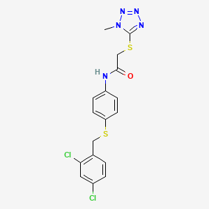 molecular formula C17H15Cl2N5OS2 B2811590 N-(4-{[(2,4-dichlorophenyl)methyl]sulfanyl}phenyl)-2-[(1-methyl-1H-1,2,3,4-tetrazol-5-yl)sulfanyl]acetamide CAS No. 303091-89-6