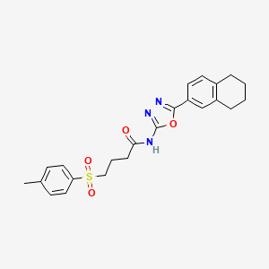 molecular formula C23H25N3O4S B2812057 N-(5-(5,6,7,8-tetrahydronaphthalen-2-yl)-1,3,4-oxadiazol-2-yl)-4-tosylbutanamide CAS No. 941878-69-9