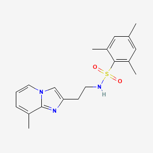 molecular formula C19H23N3O2S B2812221 2,4,6-trimethyl-N-(2-(8-methylimidazo[1,2-a]pyridin-2-yl)ethyl)benzenesulfonamide CAS No. 868979-09-3