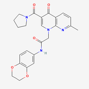 molecular formula C24H24N4O5 B2813901 N-(2,3-dihydro-1,4-benzodioxin-6-yl)-2-[7-methyl-4-oxo-3-(pyrrolidine-1-carbonyl)-1,4-dihydro-1,8-naphthyridin-1-yl]acetamide CAS No. 1251563-93-5