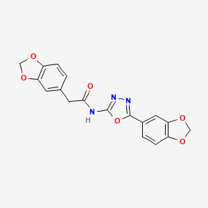 molecular formula C18H13N3O6 B2815944 2-(2H-1,3-benzodioxol-5-yl)-N-[5-(2H-1,3-benzodioxol-5-yl)-1,3,4-oxadiazol-2-yl]acetamide CAS No. 922019-11-2