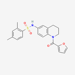 molecular formula C22H22N2O4S B2817286 N-[1-(furan-2-carbonyl)-1,2,3,4-tetrahydroquinolin-6-yl]-2,4-dimethylbenzene-1-sulfonamide CAS No. 1005293-16-2