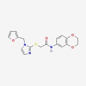 molecular formula C18H17N3O4S B2817385 N-(2,3-dihydro-1,4-benzodioxin-6-yl)-2-({1-[(furan-2-yl)methyl]-1H-imidazol-2-yl}sulfanyl)acetamide CAS No. 872594-22-4