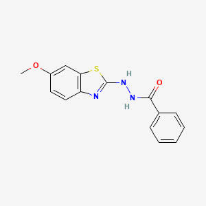molecular formula C15H13N3O2S B2817923 N'-(6-methoxybenzo[d]thiazol-2-yl)benzohydrazide CAS No. 851979-66-3