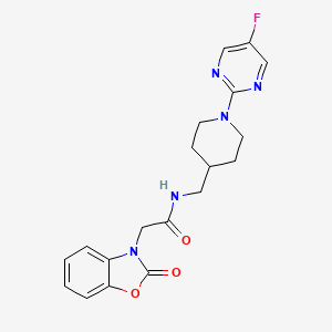 molecular formula C19H20FN5O3 B2817932 N-{[1-(5-fluoropyrimidin-2-yl)piperidin-4-yl]methyl}-2-(2-oxo-2,3-dihydro-1,3-benzoxazol-3-yl)acetamide CAS No. 2415526-75-7