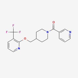 B2821123 Pyridin-3-yl-[4-[[3-(trifluoromethyl)pyridin-2-yl]oxymethyl]piperidin-1-yl]methanone CAS No. 2379975-94-5