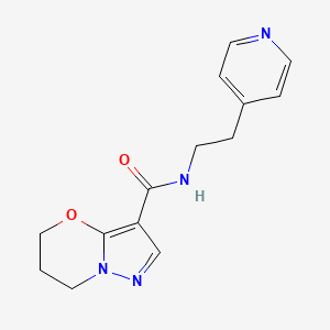 molecular formula C14H16N4O2 B2821187 N-(2-(pyridin-4-yl)ethyl)-6,7-dihydro-5H-pyrazolo[5,1-b][1,3]oxazine-3-carboxamide CAS No. 1421462-11-4