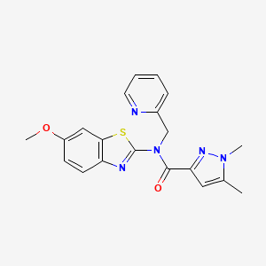 molecular formula C20H19N5O2S B2822757 N-(6-methoxy-1,3-benzothiazol-2-yl)-1,5-dimethyl-N-[(pyridin-2-yl)methyl]-1H-pyrazole-3-carboxamide CAS No. 1013811-09-0