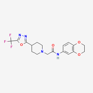 molecular formula C18H19F3N4O4 B2822793 N-(2,3-dihydro-1,4-benzodioxin-6-yl)-2-{4-[5-(trifluoromethyl)-1,3,4-oxadiazol-2-yl]piperidin-1-yl}acetamide CAS No. 1421532-89-9