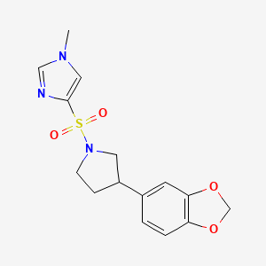 molecular formula C15H17N3O4S B2823488 4-((3-(benzo[d][1,3]dioxol-5-yl)pyrrolidin-1-yl)sulfonyl)-1-methyl-1H-imidazole CAS No. 2034341-61-0